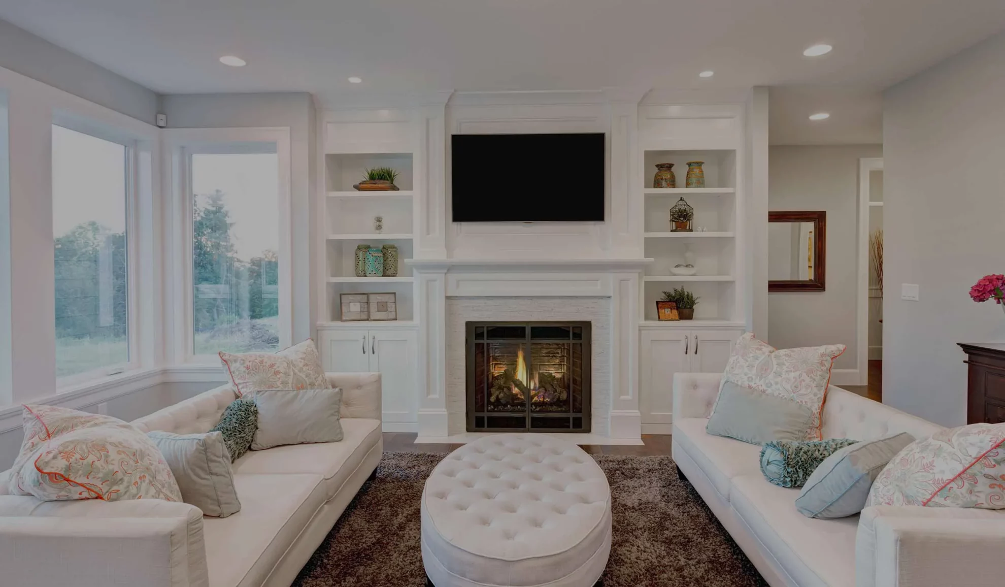 hero cozy living room with white sofa and fireplace centennial co